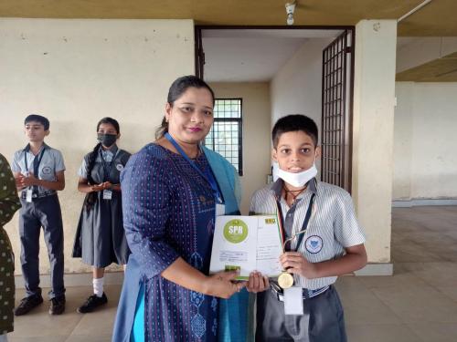 Neevan Mandlekar received a medal and a certificate of merit for the Olympiad Examination 2022-2023