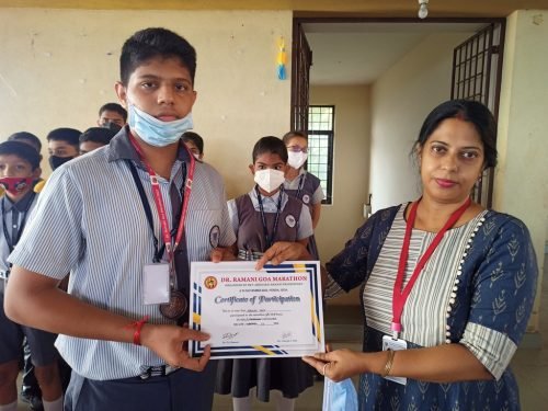 Adarsh Naik of std IX participated in 10 kms Dr Ramani Marathon 