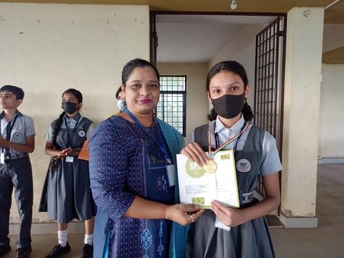 ShambhaviShambhavi Lotlikar received a medal and a certificate of merit for the Olympiad Examination 2022-2023