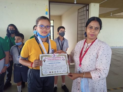 Vaishnavi Patil of std VI won a gold medal at TKAG District Karate Championship 2022.
